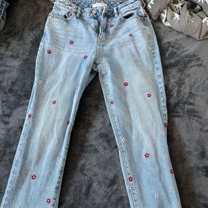 Light blue PacSun jeans with flowers